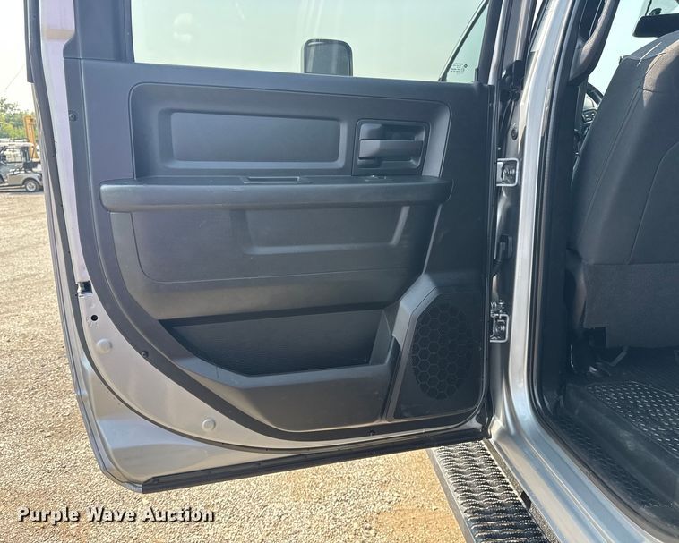 image for item NU9594 2022 RAM 5500 Crew Cab flatbed truck