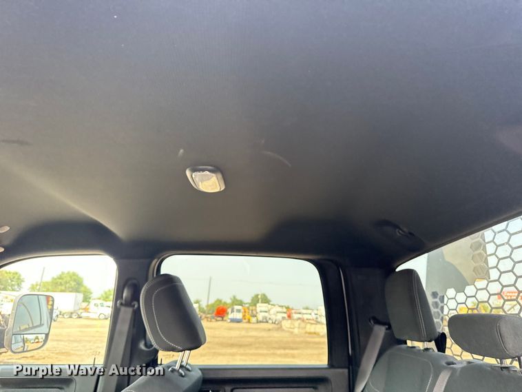 image for item NU9594 2022 RAM 5500 Crew Cab flatbed truck