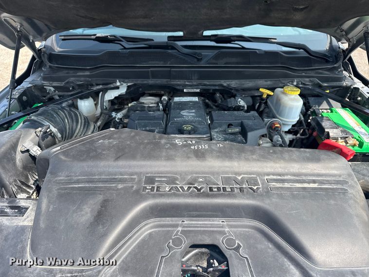 image for item NU9594 2022 RAM 5500 Crew Cab flatbed truck