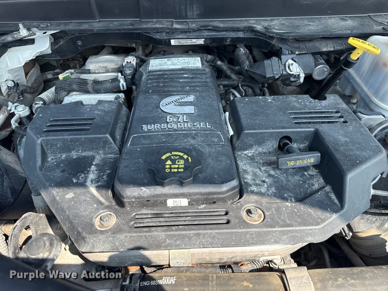 image for item NU9594 2022 RAM 5500 Crew Cab flatbed truck