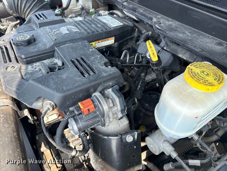 image for item NU9594 2022 RAM 5500 Crew Cab flatbed truck