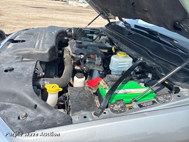 image for item NU9594 2022 RAM 5500 Crew Cab flatbed truck