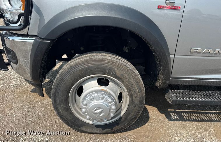 image for item NU9594 2022 RAM 5500 Crew Cab flatbed truck