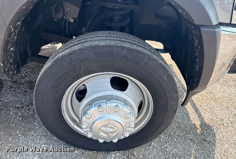 image for item NU9594 2022 RAM 5500 Crew Cab flatbed truck