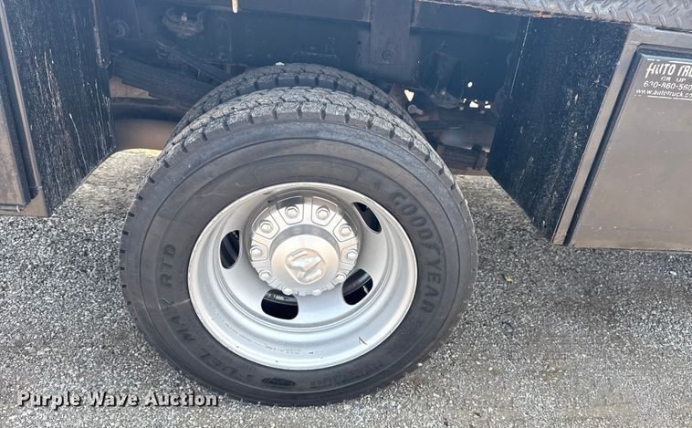 image for item NU9594 2022 RAM 5500 Crew Cab flatbed truck