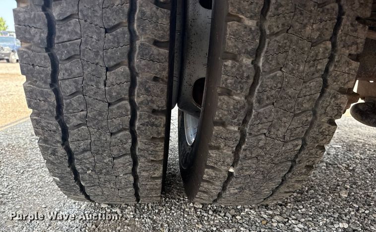 image for item NU9594 2022 RAM 5500 Crew Cab flatbed truck