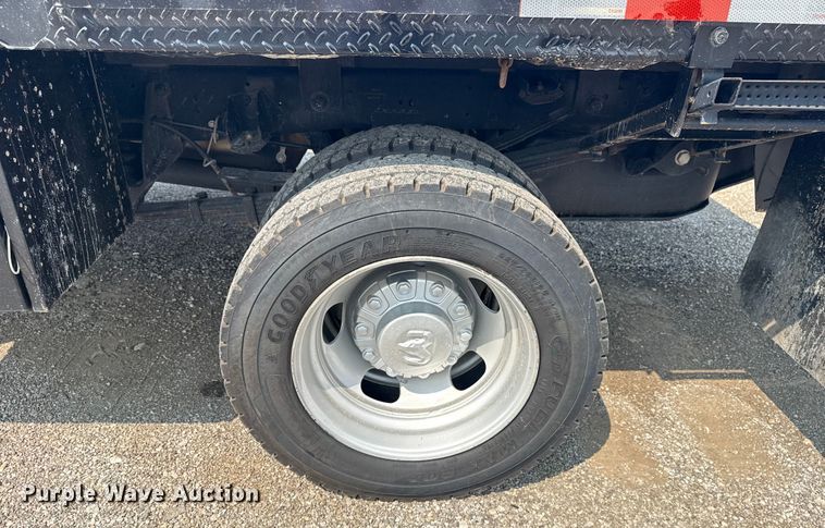 image for item NU9594 2022 RAM 5500 Crew Cab flatbed truck