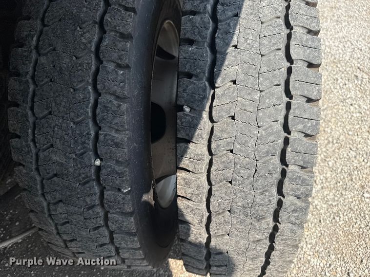 image for item NU9594 2022 RAM 5500 Crew Cab flatbed truck