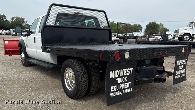 image for item NU9609 2012 Ford F350 Super Duty Crew Cab flatbed pickup truck