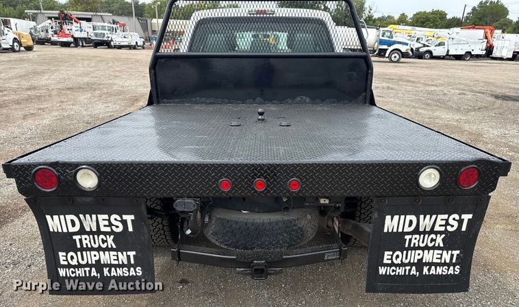 image for item NU9609 2012 Ford F350 Super Duty Crew Cab flatbed pickup truck