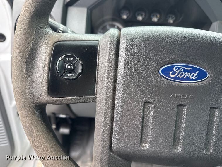 image for item NU9609 2012 Ford F350 Super Duty Crew Cab flatbed pickup truck