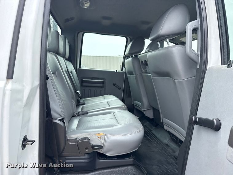 image for item NU9609 2012 Ford F350 Super Duty Crew Cab flatbed pickup truck