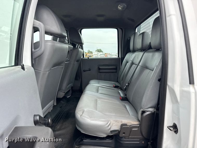 image for item NU9609 2012 Ford F350 Super Duty Crew Cab flatbed pickup truck