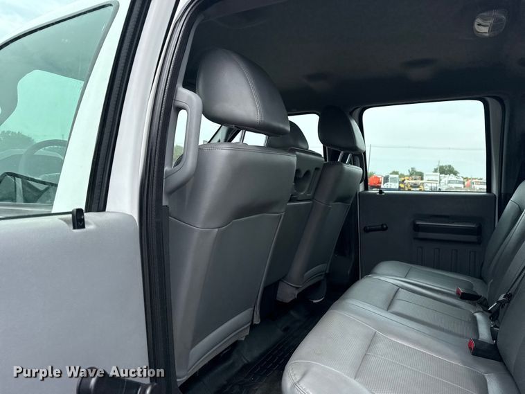 image for item NU9609 2012 Ford F350 Super Duty Crew Cab flatbed pickup truck