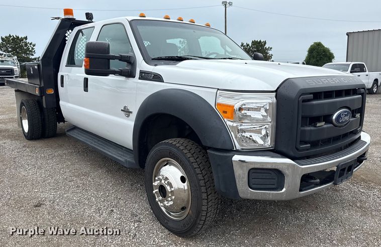 image for item NU9616 2016 Ford F550 Super Duty Crew Cab flatbed truck
