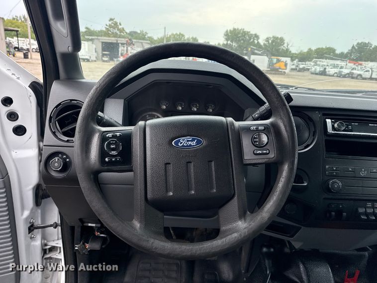 image for item NU9616 2016 Ford F550 Super Duty Crew Cab flatbed truck