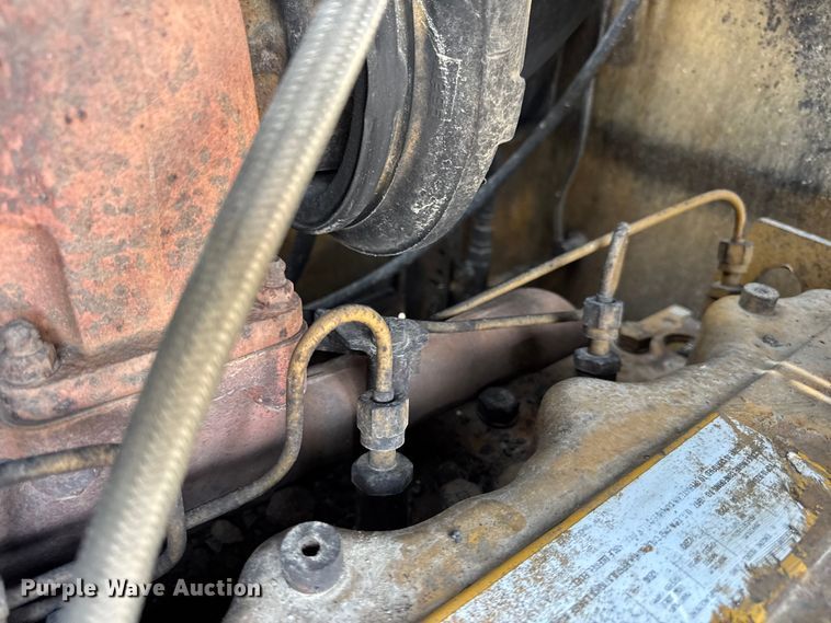 image for item DW6597 1997 Caterpillar 140H motor grader