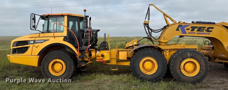 image for item DZ8974 2019 Volvo A30G articulated scraper truck with 2016 K-Tec 1228 scraper
