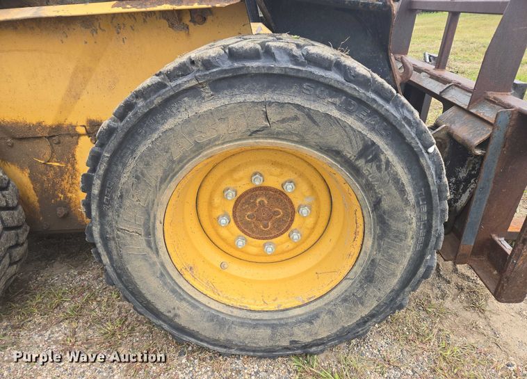 image for item EB1029 1997 New Holland LX665 skid steer loader