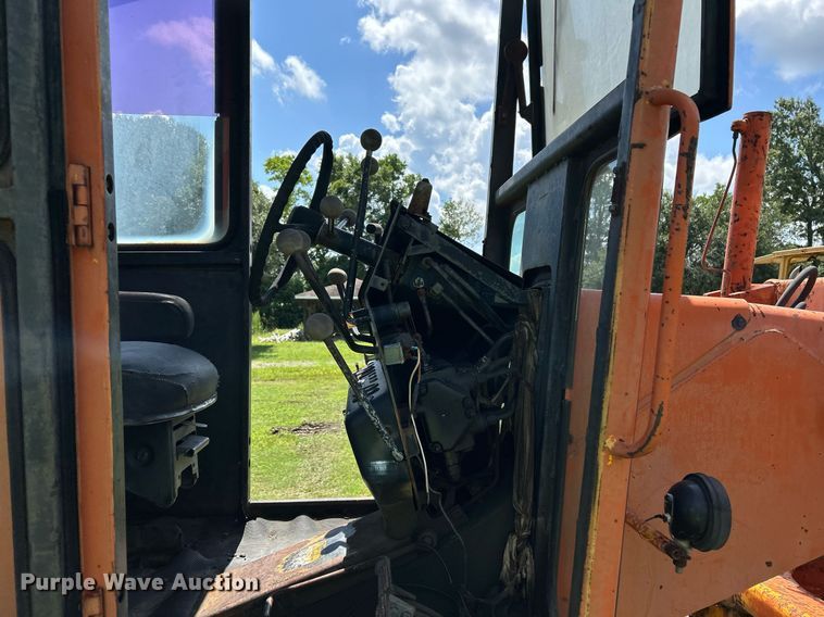 image for item EC1403 1983 John Deere 570A motor grader