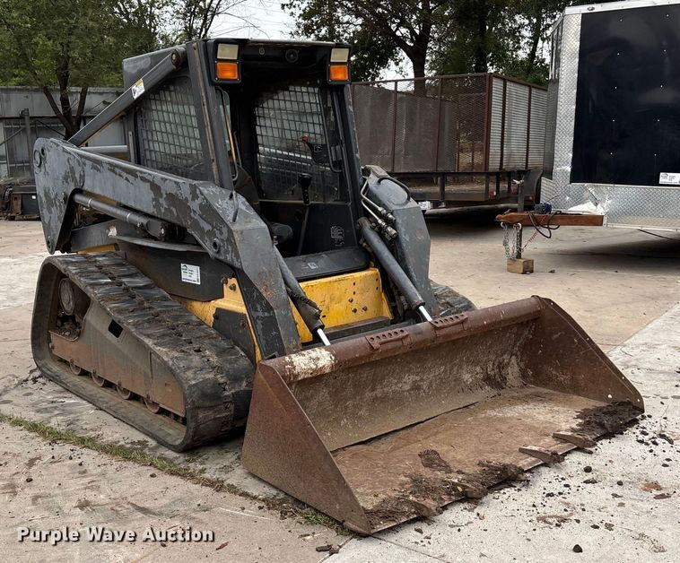 MINI CARGADOR SOBRE ORUGAS NEW HOLLAND NONE
