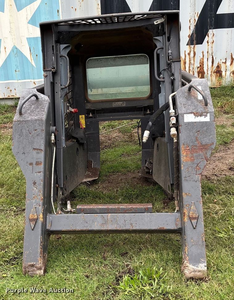image for item EE3972 New Holland L 190 skid steer cab and loader arms
