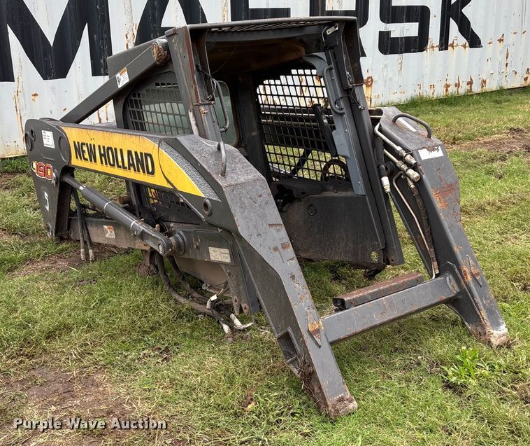 image for item EE3972 New Holland L 190 skid steer cab and loader arms