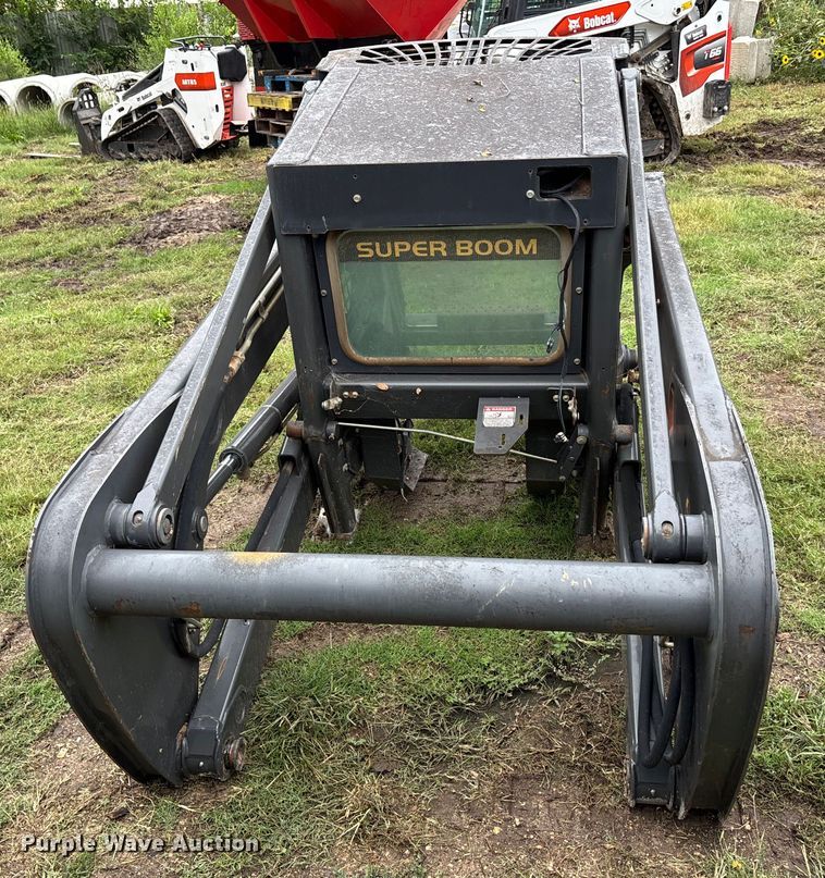 image for item EE3972 New Holland L 190 skid steer cab and loader arms