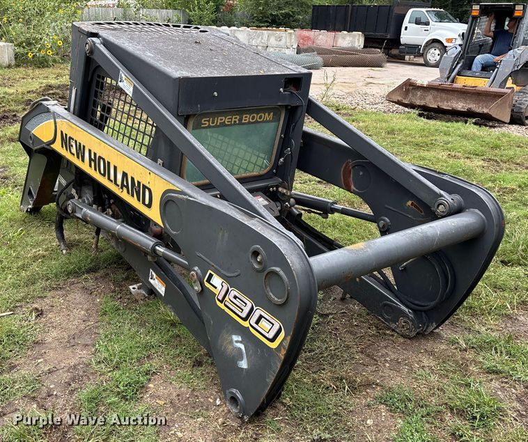 image for item EE3972 New Holland L 190 skid steer cab and loader arms
