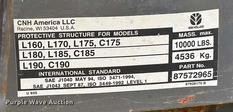 image for item EE3972 New Holland L 190 skid steer cab and loader arms