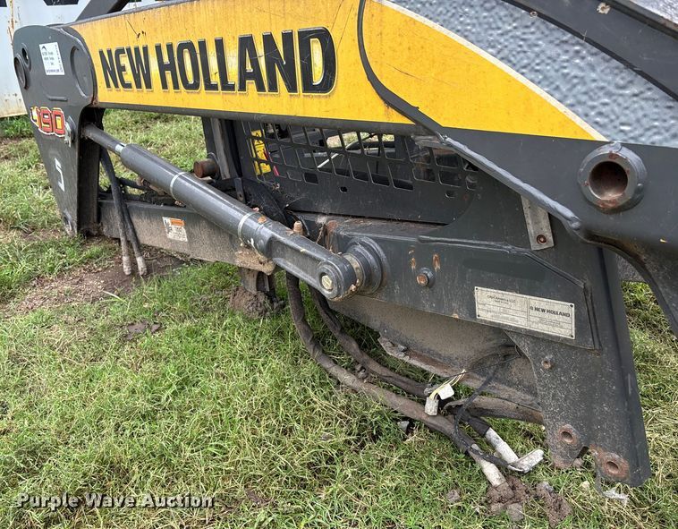image for item EE3972 New Holland L 190 skid steer cab and loader arms
