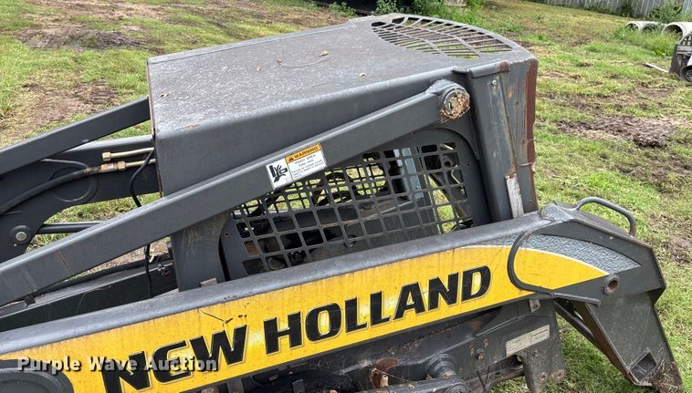 image for item EE3972 New Holland L 190 skid steer cab and loader arms