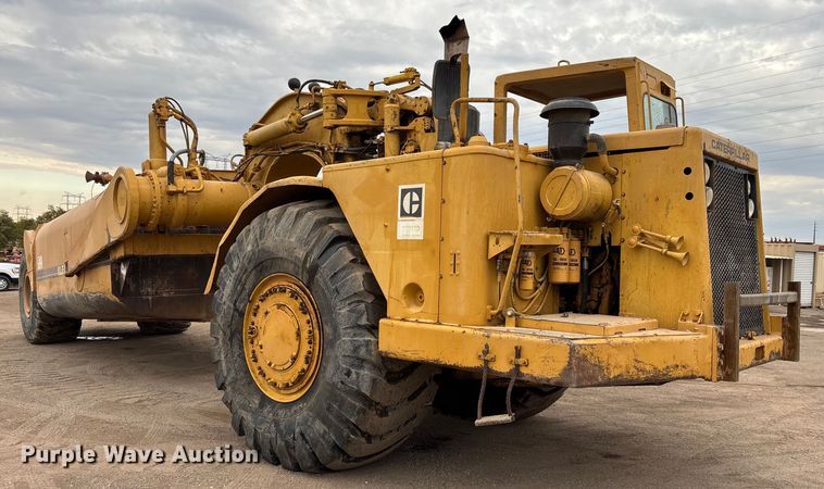 image for item EM5059 1977 Caterpillar 631D water wagon