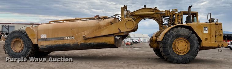 image for item EM5059 1977 Caterpillar 631D water wagon