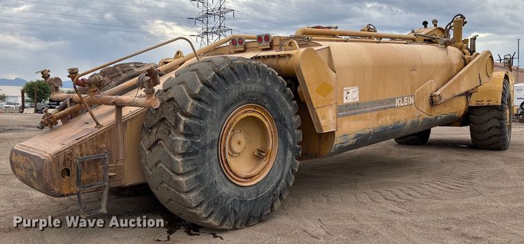 image for item EM5059 1977 Caterpillar 631D water wagon