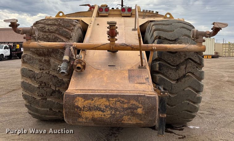 image for item EM5059 1977 Caterpillar 631D water wagon