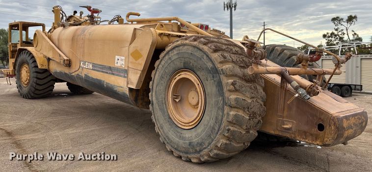 image for item EM5059 1977 Caterpillar 631D water wagon