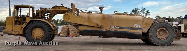 image for item EM5059 1977 Caterpillar 631D water wagon