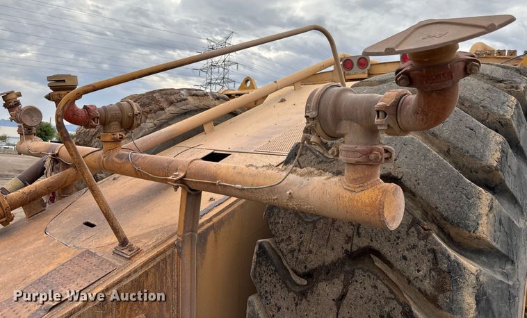 image for item EM5059 1977 Caterpillar 631D water wagon