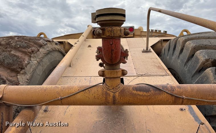 image for item EM5059 1977 Caterpillar 631D water wagon