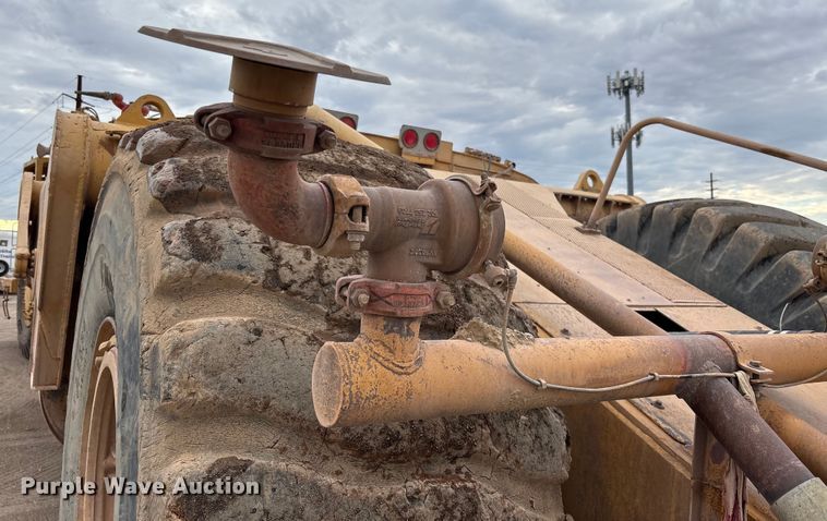 image for item EM5059 1977 Caterpillar 631D water wagon