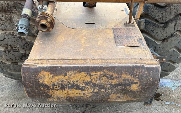 image for item EM5059 1977 Caterpillar 631D water wagon