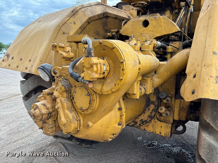 image for item EM5059 1977 Caterpillar 631D water wagon