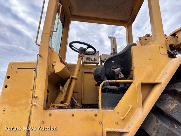 image for item EM5059 1977 Caterpillar 631D water wagon