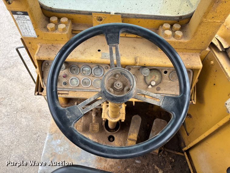 image for item EM5059 1977 Caterpillar 631D water wagon