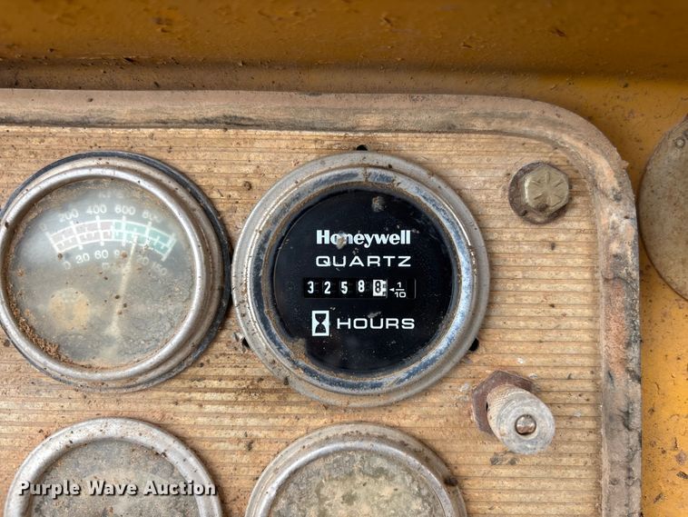 image for item EM5059 1977 Caterpillar 631D water wagon