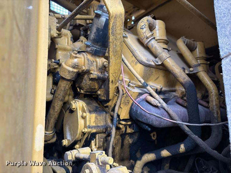 image for item EM5059 1977 Caterpillar 631D water wagon