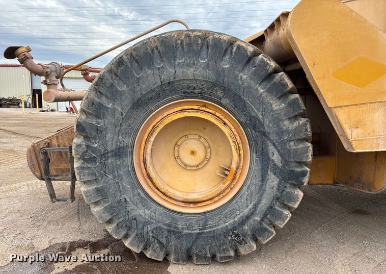 image for item EM5059 1977 Caterpillar 631D water wagon