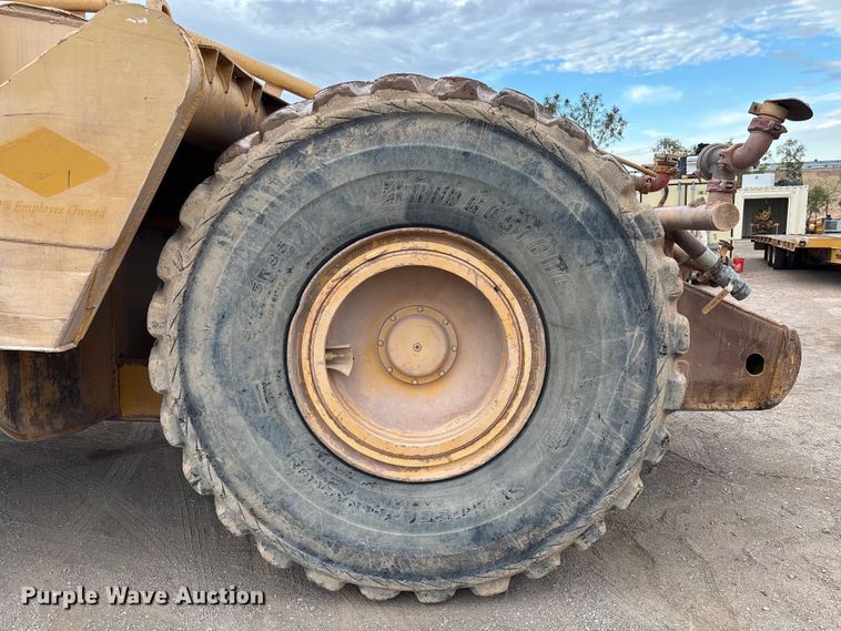 image for item EM5059 1977 Caterpillar 631D water wagon