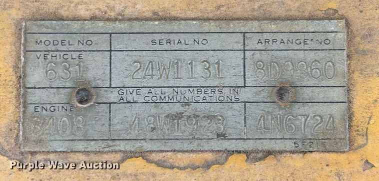 image for item EM5059 1977 Caterpillar 631D water wagon